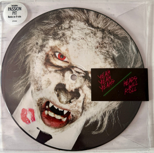 Yeah Yeah Yeahs – Heads Will Roll -2009